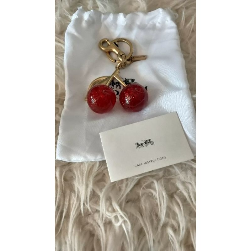 cherry coach bag charm