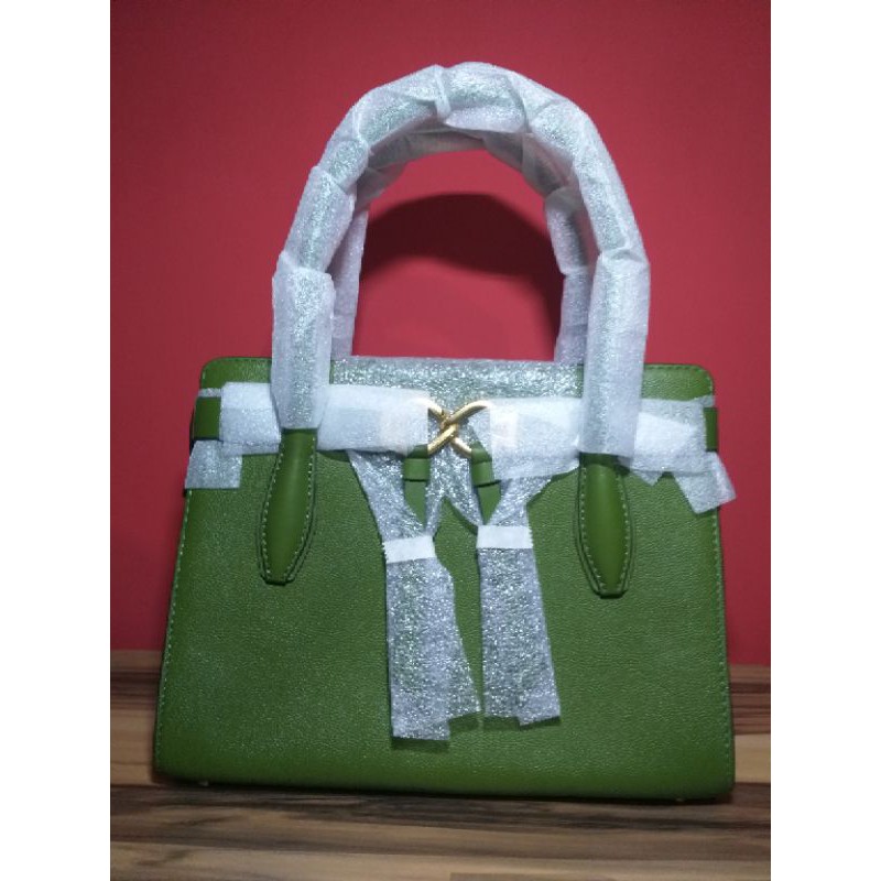 Kate Spade toujours sale