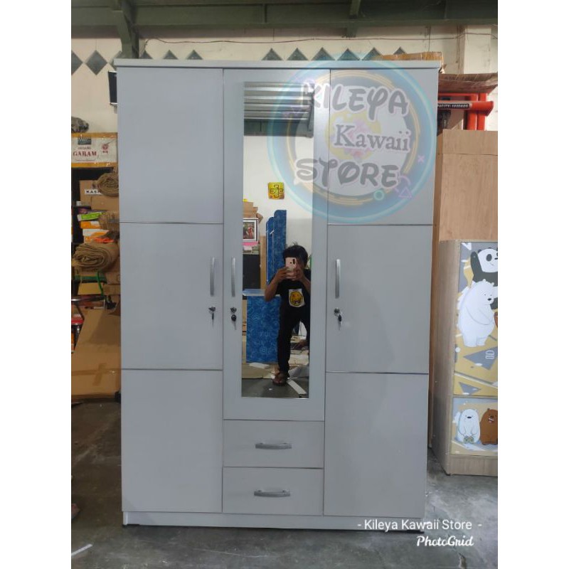 lemari partikel 3 pintu putih