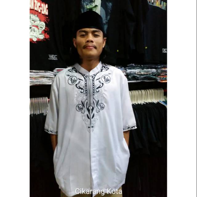 Baju koko iwan fals
