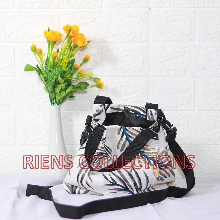 SLING BAG TAS SELEMPANG KANVAS MOTIF FLORAL LATAR PUTIH RIENS COLLECTIONS. TAS KANVAS JOGJA