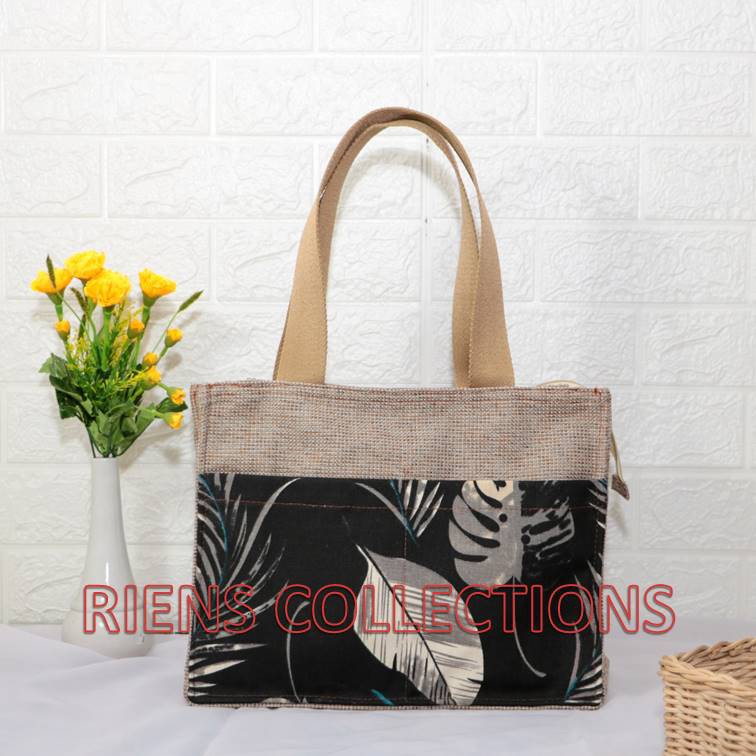 RIENS COLLECTIONS. TAS GONI WANITA KOMBINASI KANVAS MOTIF FLORAL LATAR HITAM