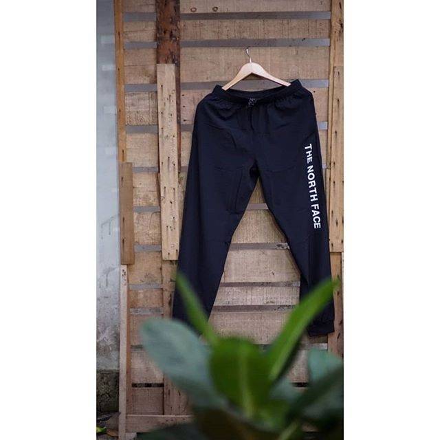 the north face train n logo track pants