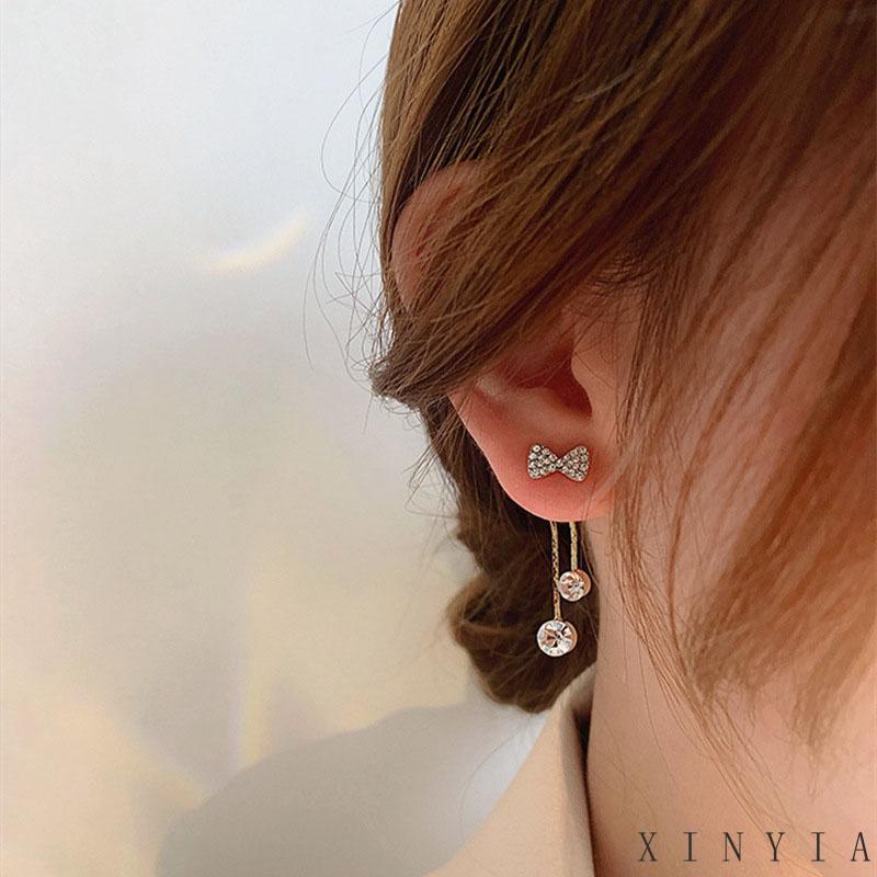 Aksesori fashion wanita versi Korea dari anting rumbai panjang bintang busur sederhana dan serbaguna