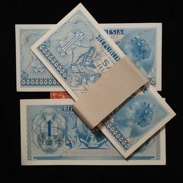 (Gress/Baru) 2 lembar set uang kuno 1 rupiah tahun 1956 sandang pangan dan 1961 suku bangsa