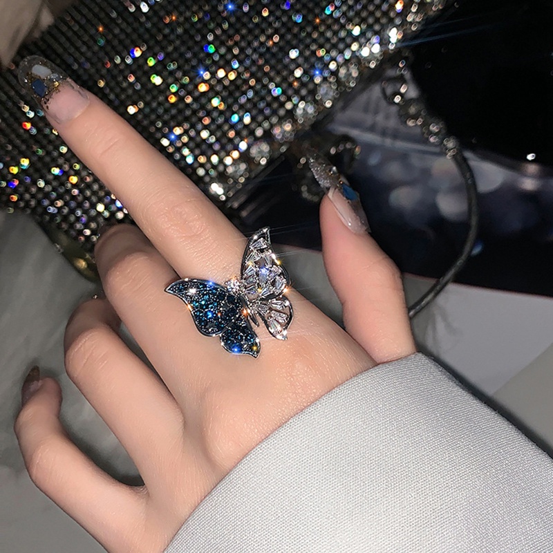 Cincin Model Terbuka Adjustable Desain Kupu-Kupu Biru Aksen Zircon Untuk Wanita