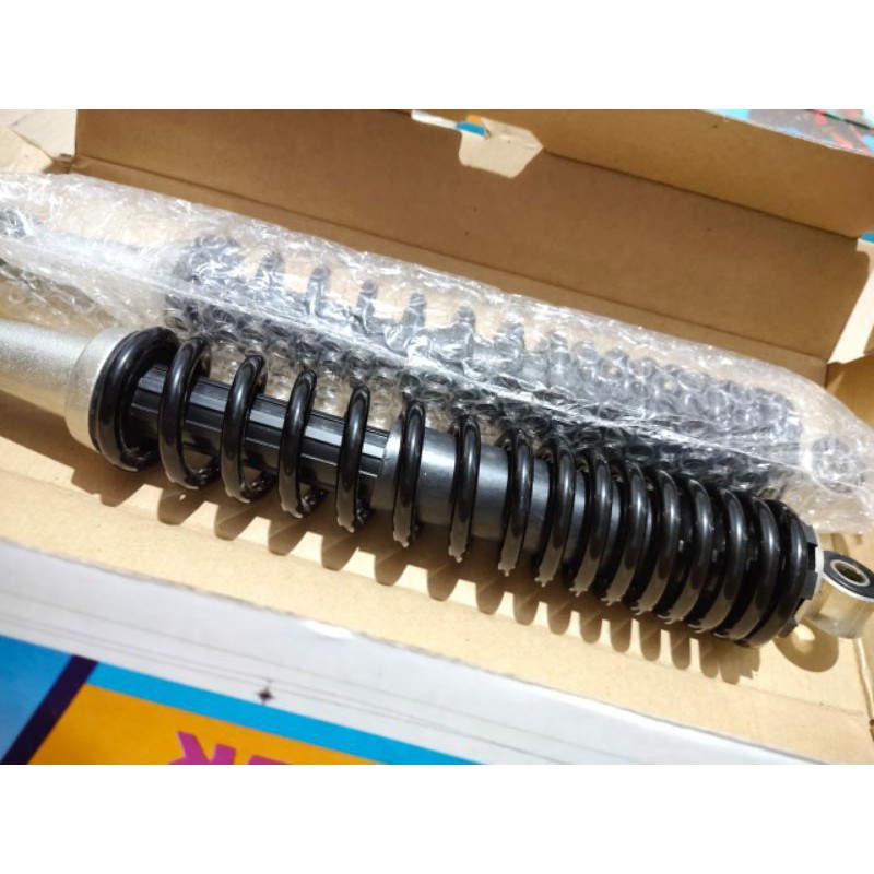 Shock Absorber Belakang Motor Revo