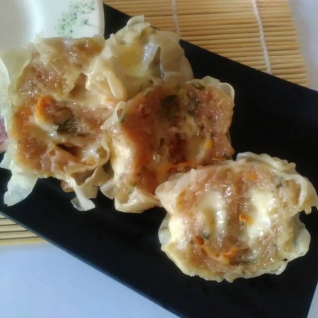 

Dimsum Siomay Ayam Udang Filling Keju Easy Melt noni. Isi 6 buah per pack