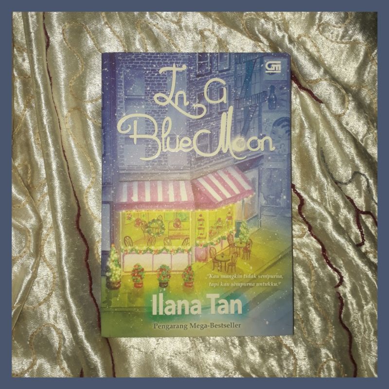 preloved buku novel in a blue moon ilana tan