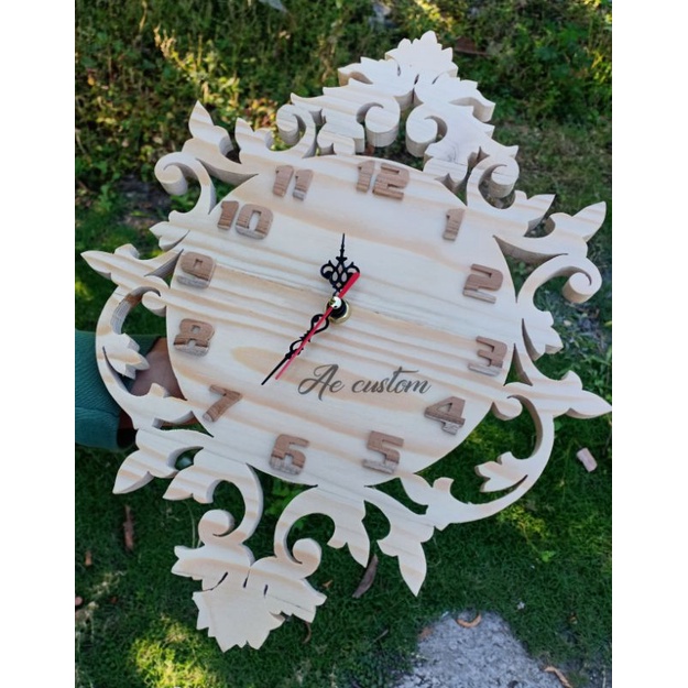 Jam dinding kayu ukir