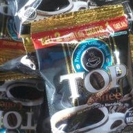 

TOP Coffee 1"renteng isi 10 saset dan top coffe pouch