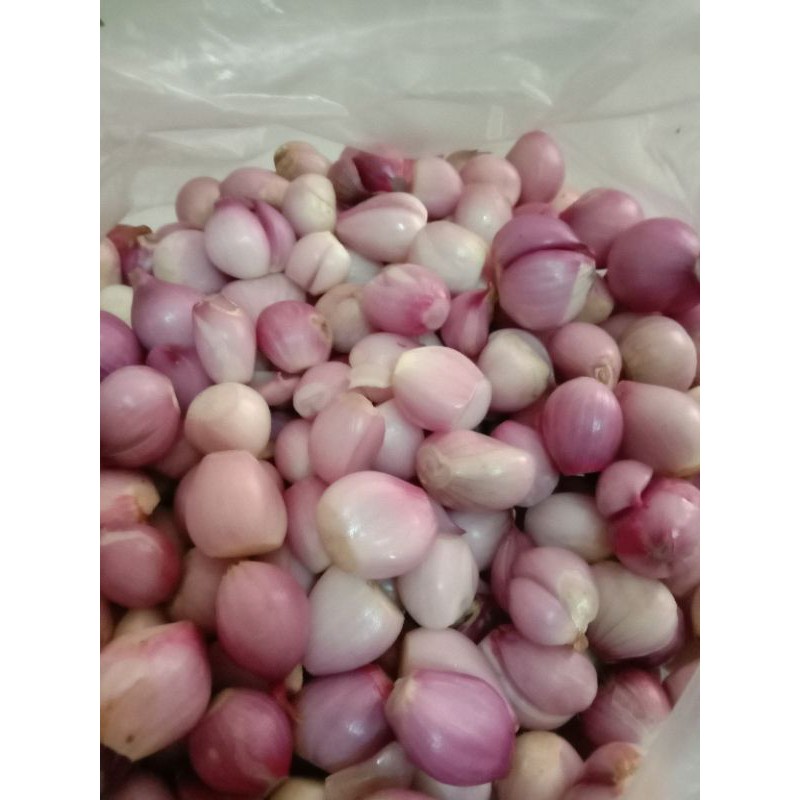 

Bawang merah kupas isi 250gram