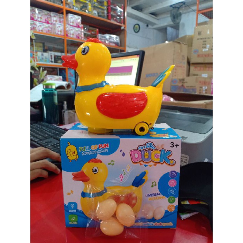 Bebek Telor Jalan Musik Lampu Mainan Bebek Baterai Mainan Bebek Bertelur