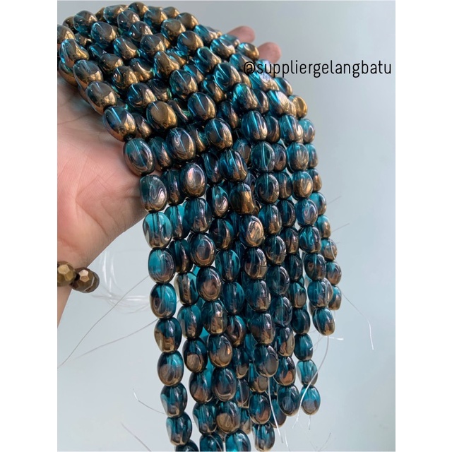 kristal CEKO KACANG GOLD BLUE QUARTZ 10mm BIRU emas kuarsa oval cuting