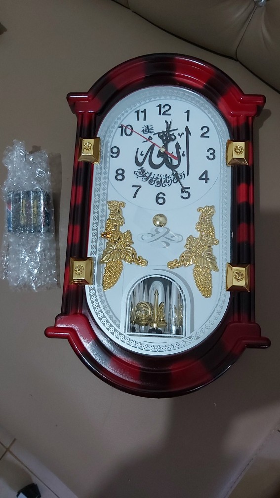 Jam Dinding Unik Bunyi Komedi Putar