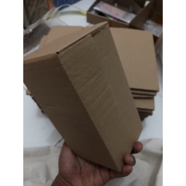 

kardus packing online shop. kardus packing handphone pas longgar. kardus packing aman