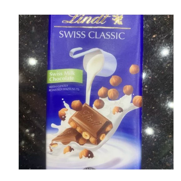 

Lindt SWISS CLASSIC Gently Roasted Hazelnut 100gr Swiss Milk Chocolate