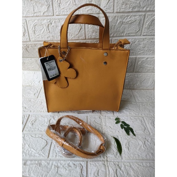 Tas selempang wanita branded matahari original connexion sisa rijek