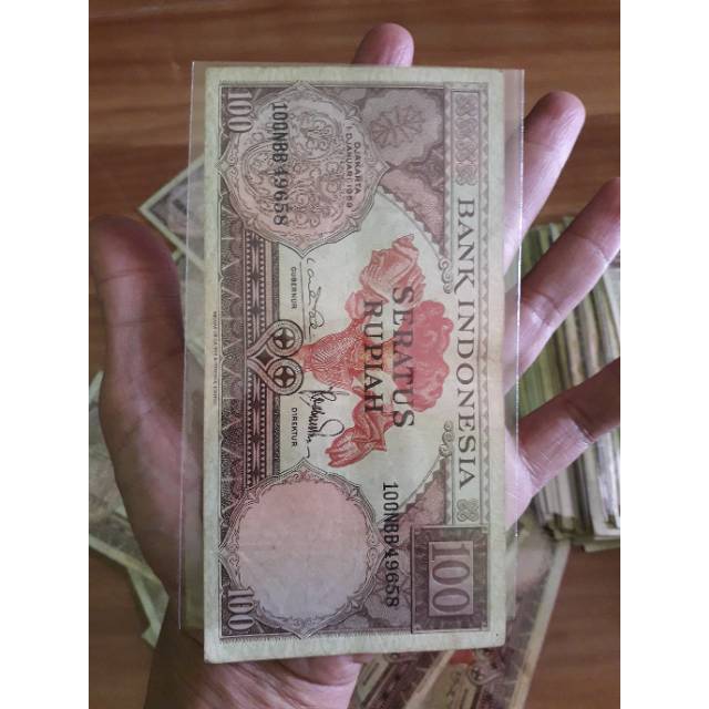 Uang kuno 100 bunga bangkai