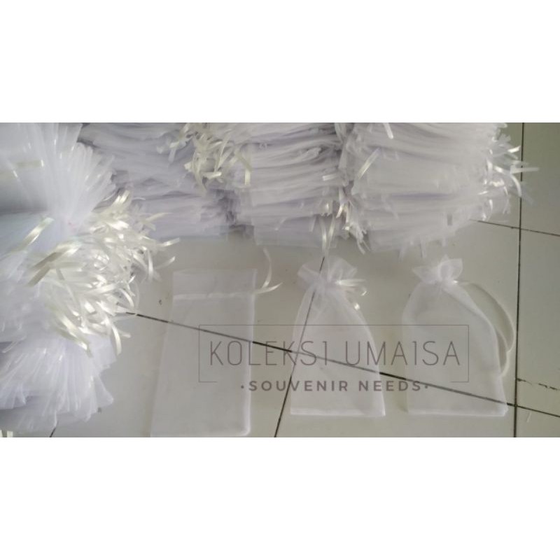 Kantong tile souvenir handuk