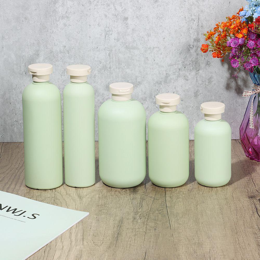 Botol Dispenser Sabun Cair Lotion Sampo Portabel Bentuk Bulat Bahan Plastik Dapat Diisi Ulang Tahan Karat 200ML ~ 500ML