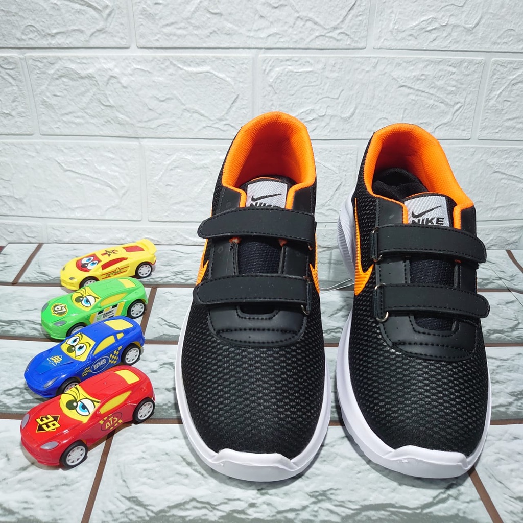 Sepatu Sneakers Sepatu Anak Import zoom Size hitam oranye perekat 26-37 Usia 4-10 Tahun