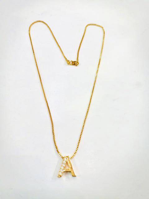 kalung titanium kacang viral