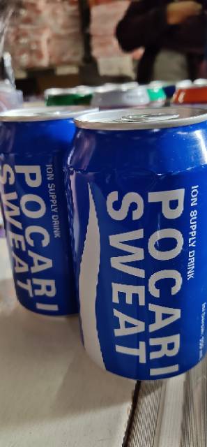 POCARI KALENG UKURAN 330ML. 6 KALENG