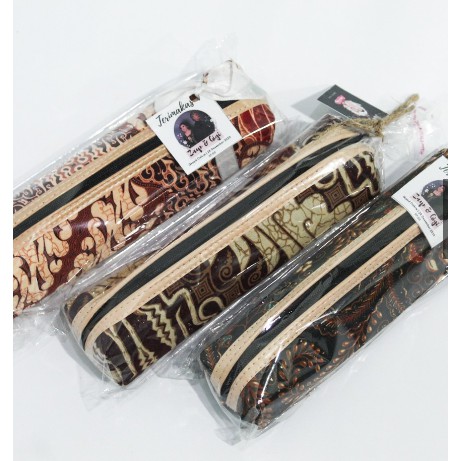 

Souvenir tempat pensi dikemas plastik