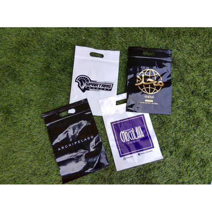 

PLASTIK KLIP PLONG 20x25 + 7cm, sablon plastik packaging untuk hijab - Putih