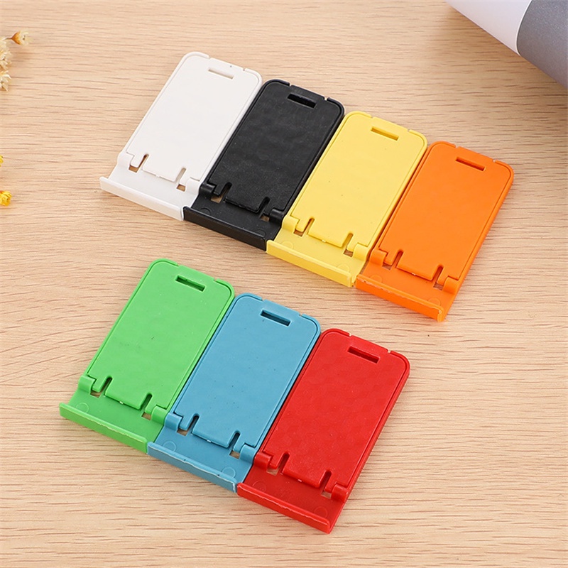 1pc Stand Holder Lipat Universal Warna Permen Untuk Handphone / Tablet