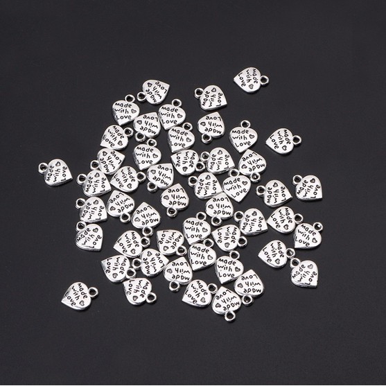 10pcs Liontin Bentuk Hati Bahan Metal Warna Silver Untuk Gelang Dan Kalung Charms