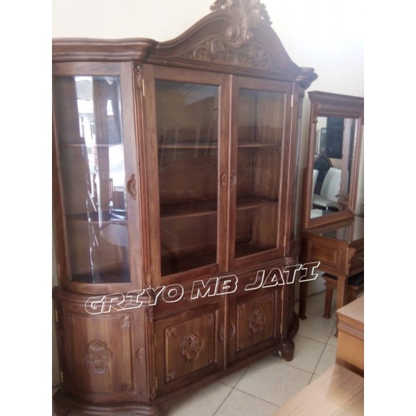 bufet lemari hias kaca ruang tamu ukiran kayu jati