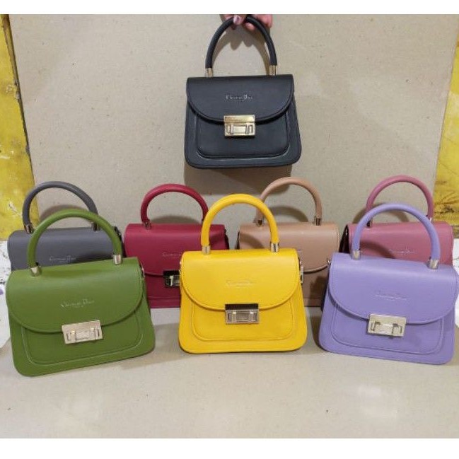 

TAS KOTAK TENTENG BULAT