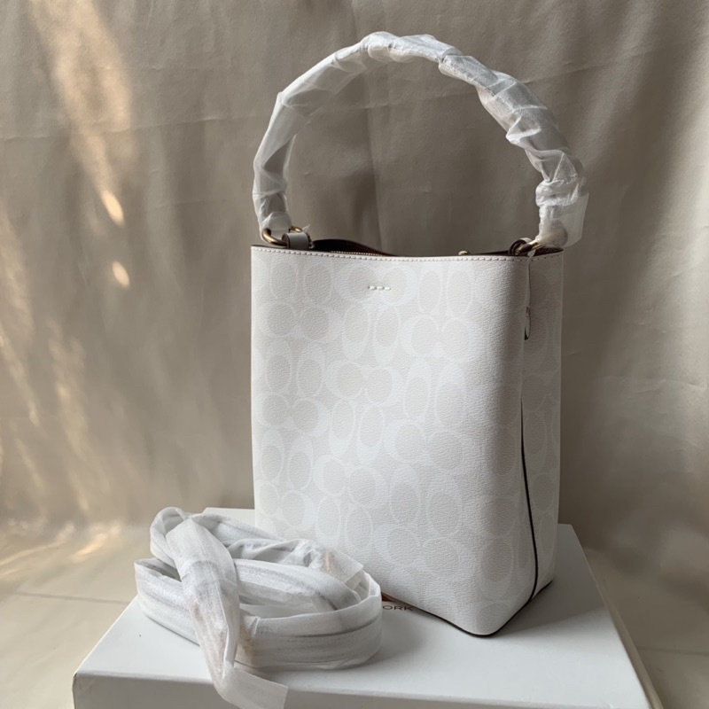 SMALL TOWN BUCKET BAG IN SIGNATURE CANVAS - White (2312)