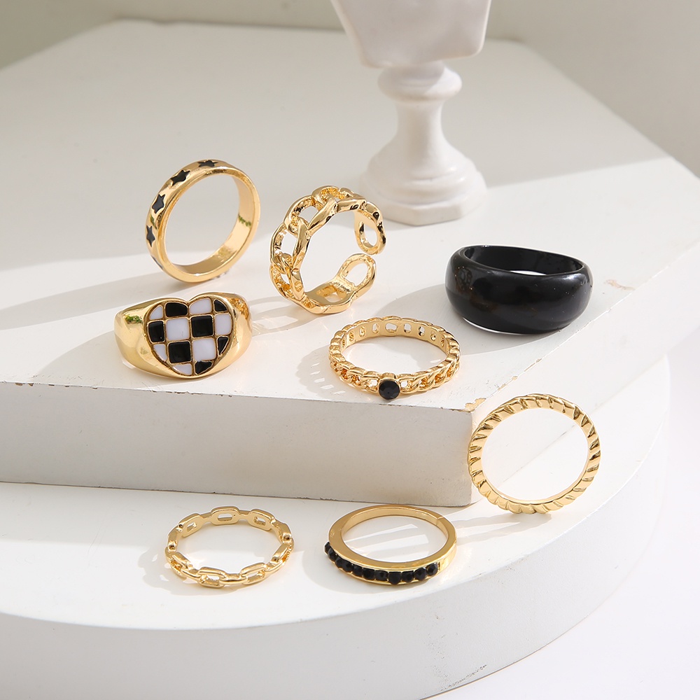 YEEZII 8pcs / Set Cincin Model Hollow Motif Hati / Bintang / Papan Catur Aksen Batu Resin Warna Hitam Untuk Wanita