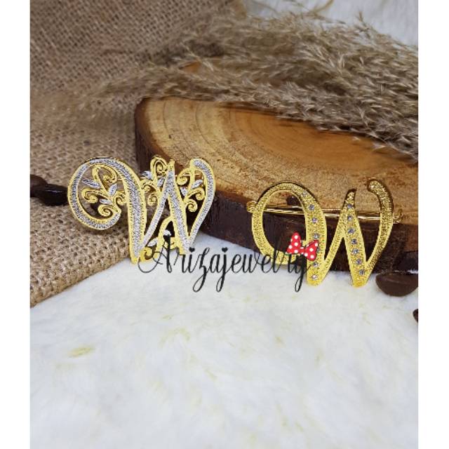 Bros huruf inisial lapis emas