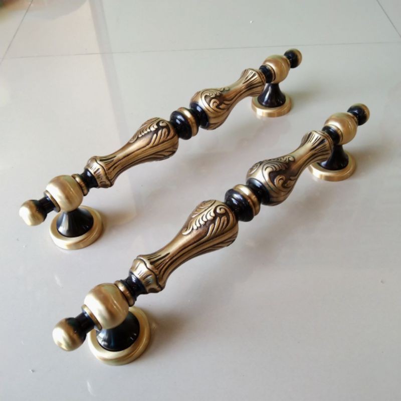 Handel pintu rumah kuningan model pion