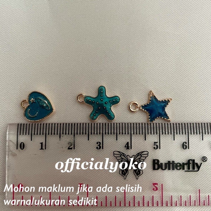 Charm Edisi Planet (ukuran di gambar)