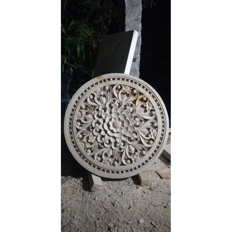 relief bundar batu alam