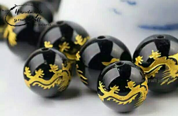 Butir Batu Black Onyx Tibetan Dragon Carved Stone