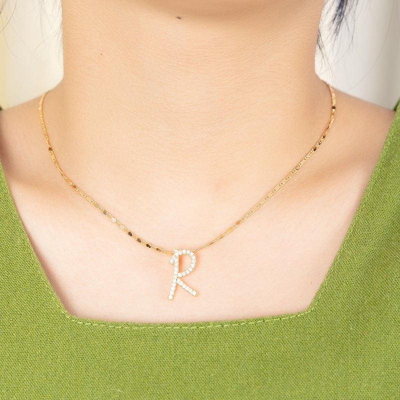 kalung motif  huruf berlian lapis emas