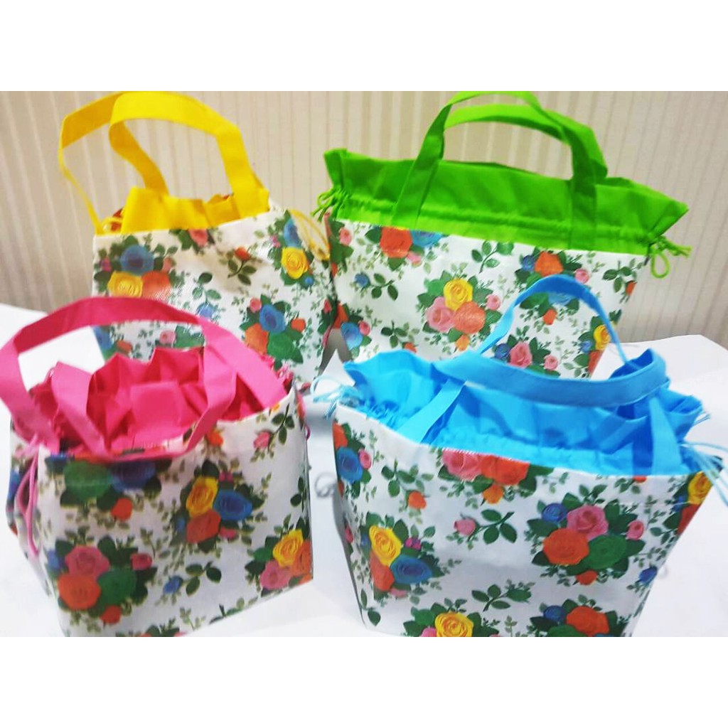 

Tas Serut Jinjing Nasi Kotak Waterproof Laminated Spunbond Floral Pouch Tote Goodie Bag