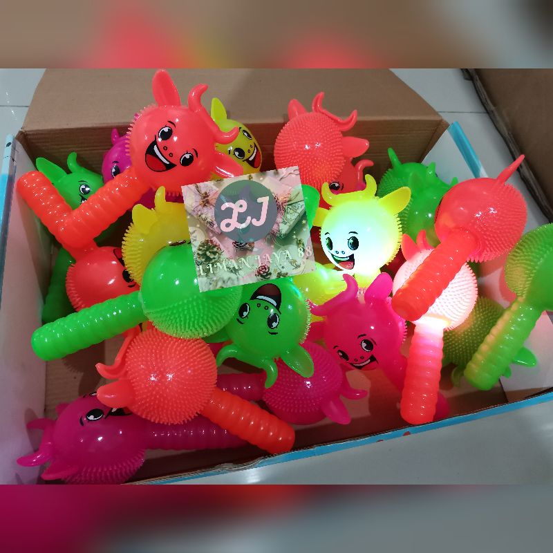 RUBBER STIK TOYS STICK TOY MAINAN ANAK Boneka Lampu dan Suara Puffer Ball cute animal best