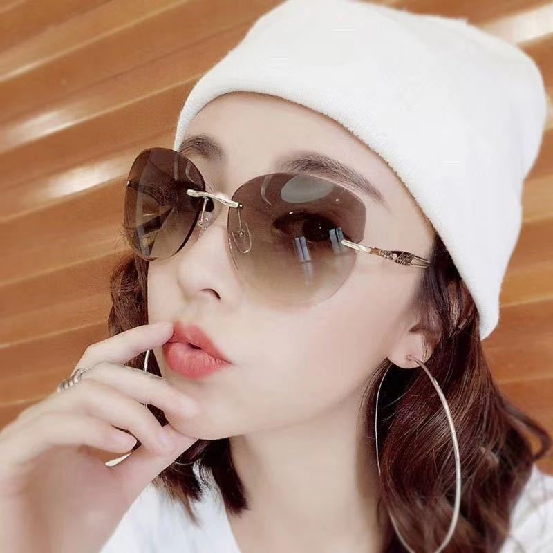 Kacamata Hitam Model Mata Kucing Rimless Perlindungan UV400 Untuk Wanita