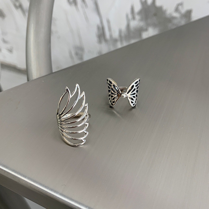 2pcs / Set Cincin Jari Telunjuk Model Terbuka Desain Kupu-Kupu Hollow Warna Silver Untuk Wanita