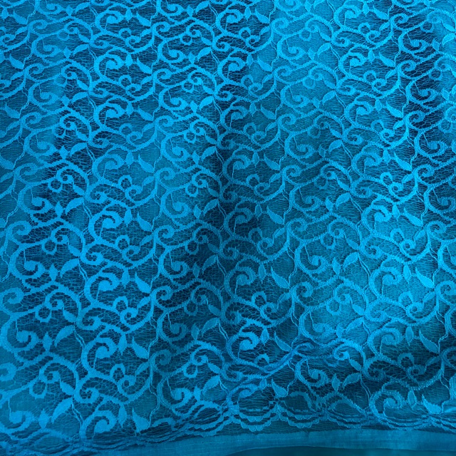 Kain broklat motif rumput laut warna biru turkis