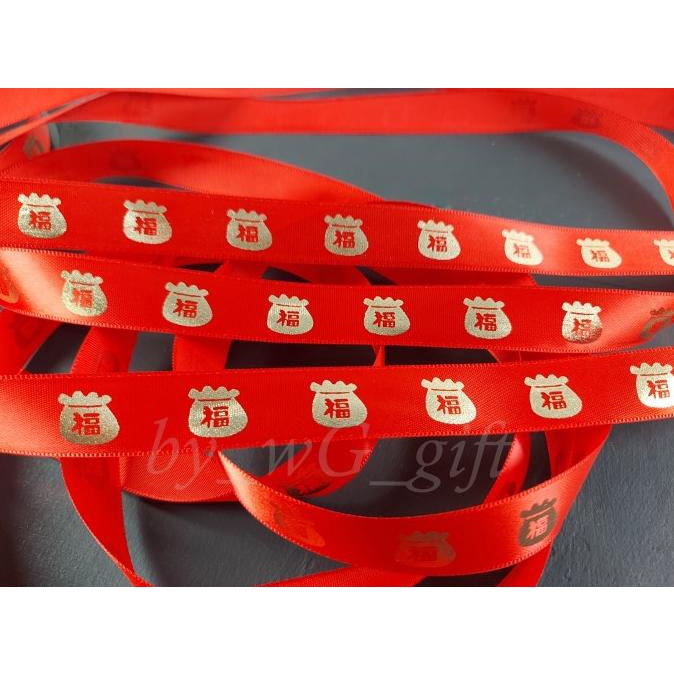 

Best Product!!! Pita Imlek / Sincia / Chinese New Year ; Lebar 2 Cm; Motif Money Bag - Paling Diminati