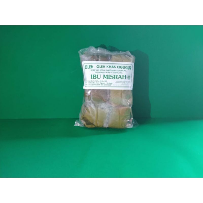 

Ibu Misrah Tape Ketan Bulat Hijau Asli Cigugur Bungkus Daun Jambu Kemasan Plastik Isi 12