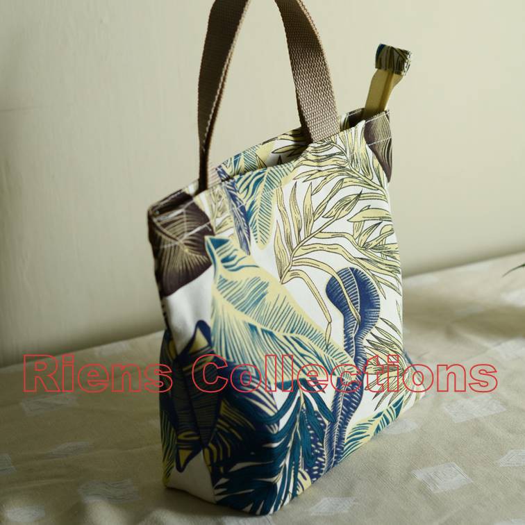 RIENS COLLECTIONS. HANDBAG BESAR BAHAN KANVAS MOTIF TROPIKAL
